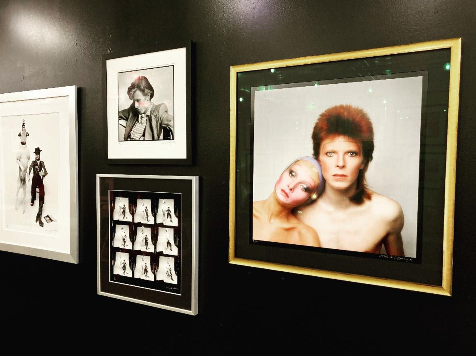 Prints of David Bowie hanging in Modern Rocks Gallery in Austin