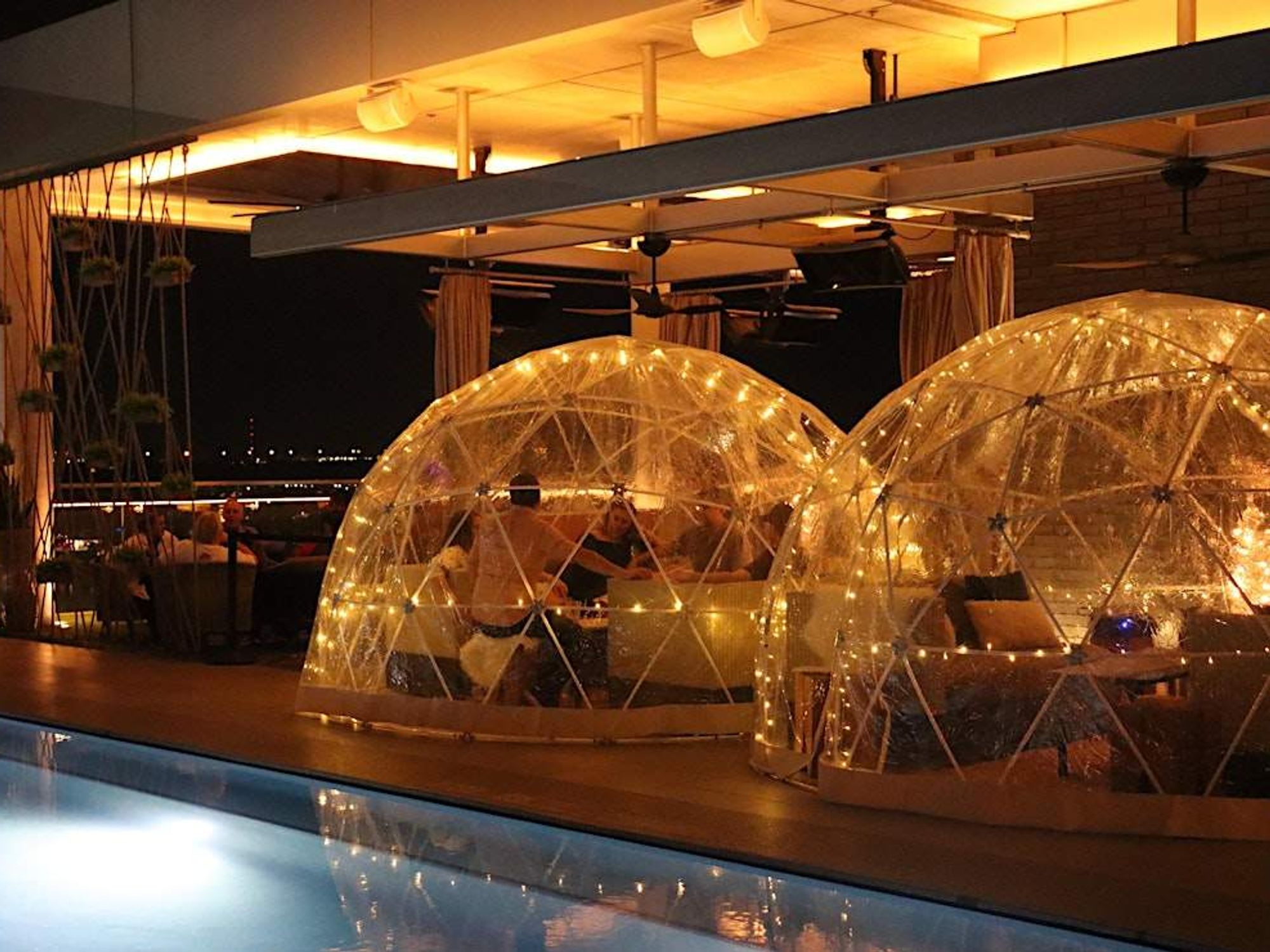 Private igloos at the Otis Hotel's Otopia Rooftop Bar.