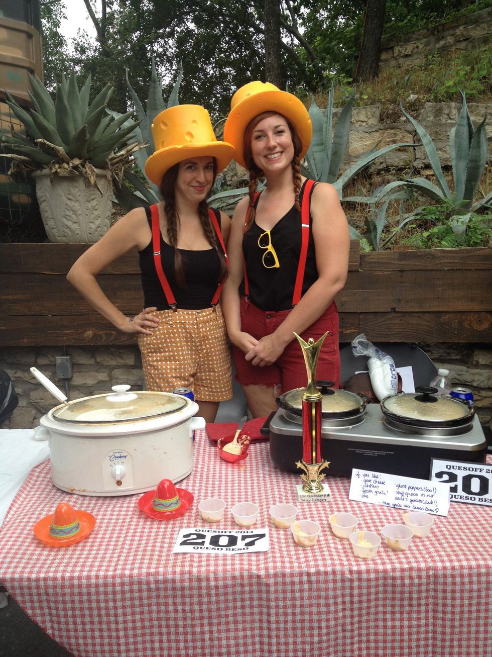 Quesoff IV competitors with cheese hats