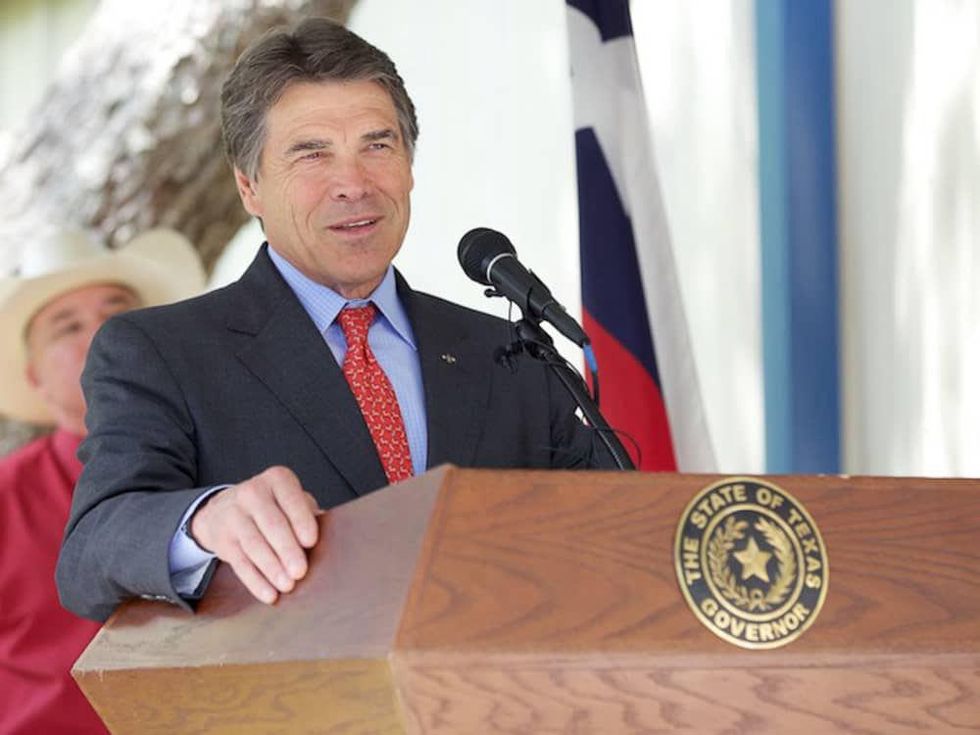 Rick Perry at mic and podium May 2013