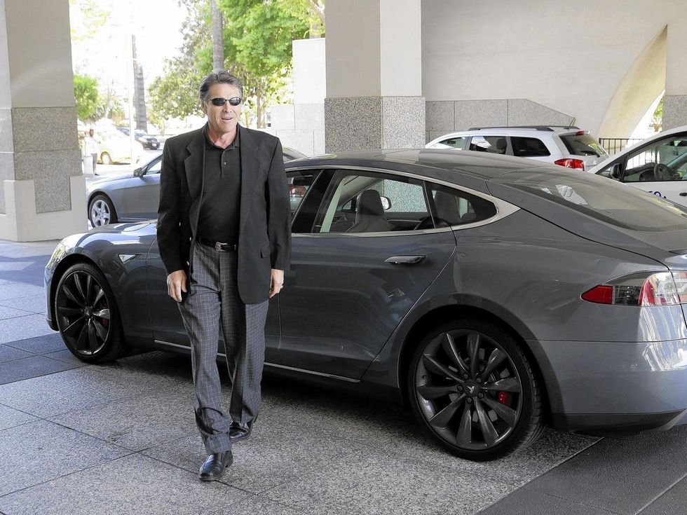 Rick Perry in California 2014 wearing slick suit