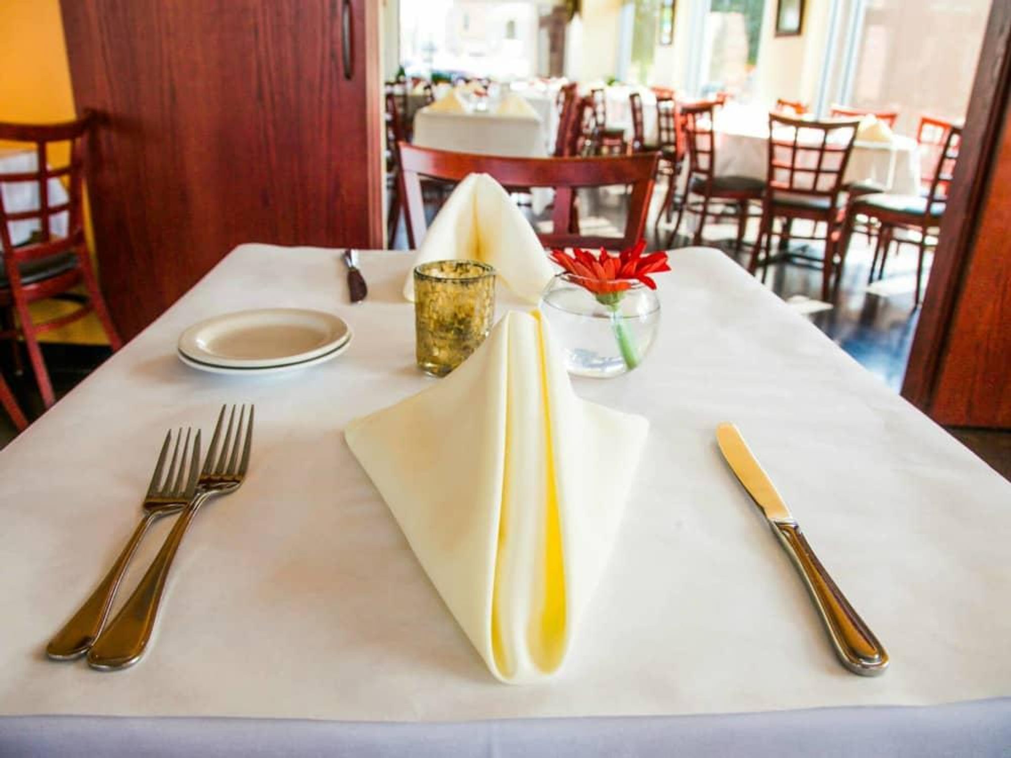 Sagra restaurant Austin Italian interior place setting table plate