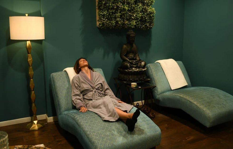 Sanctuary Spa relaxation room woman