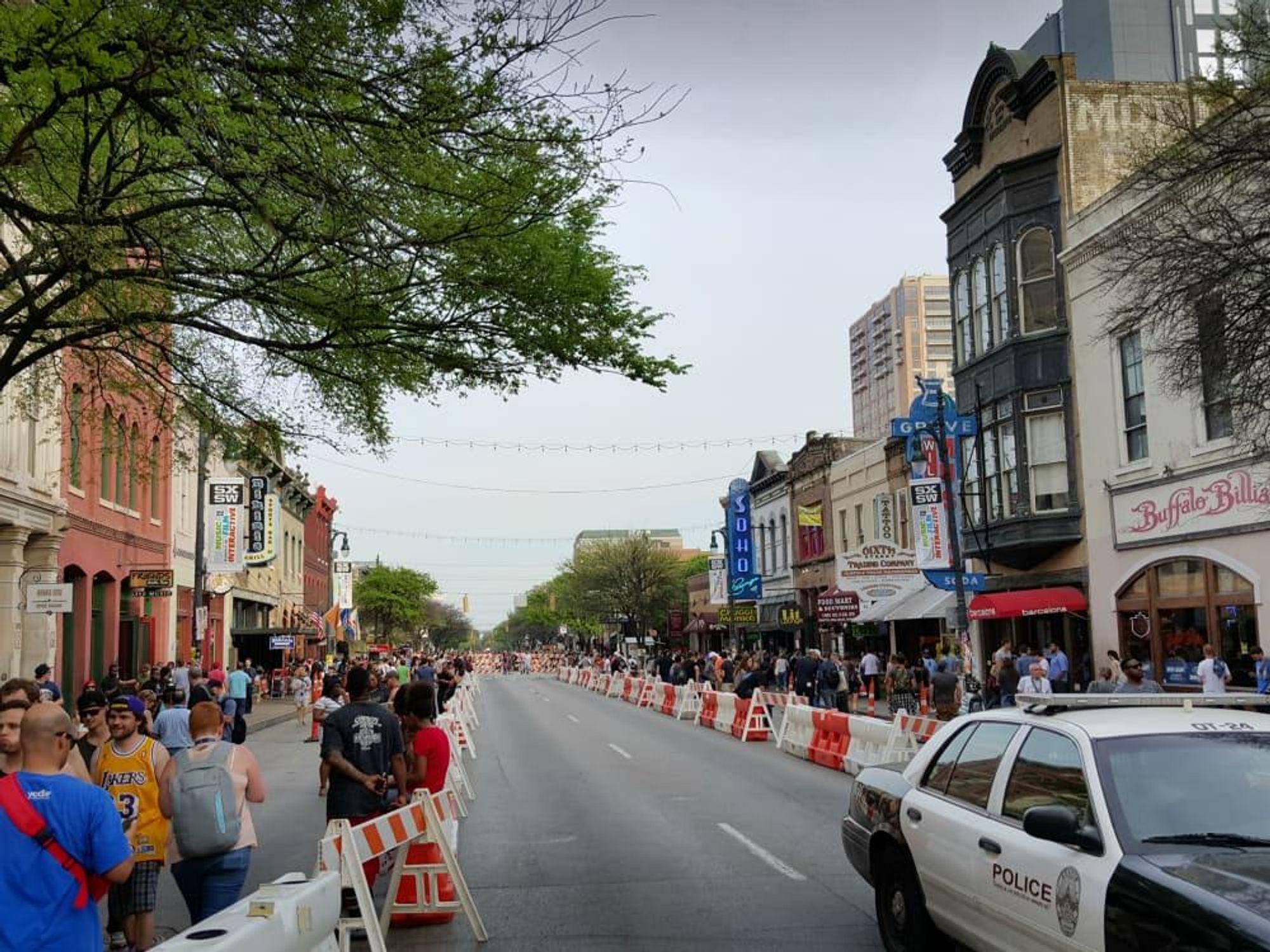 Sixth Street downtown Austin SXSW police security safety barriers March 2016
