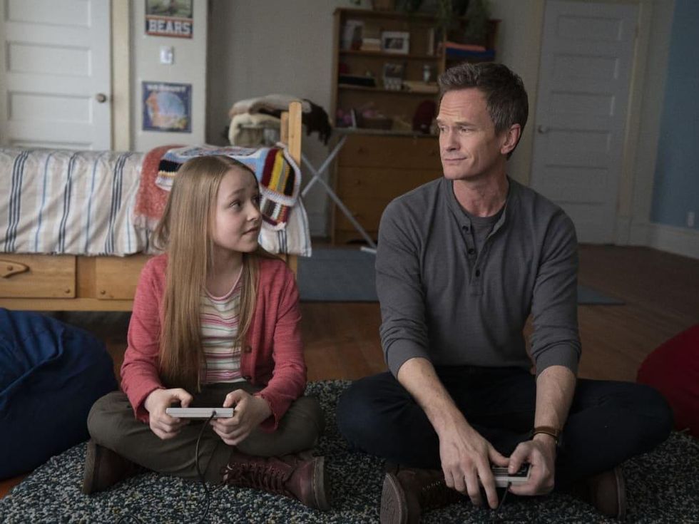 Sophia Reid-Gantzert and Neil Patrick Harris in 8-Bit Christmas