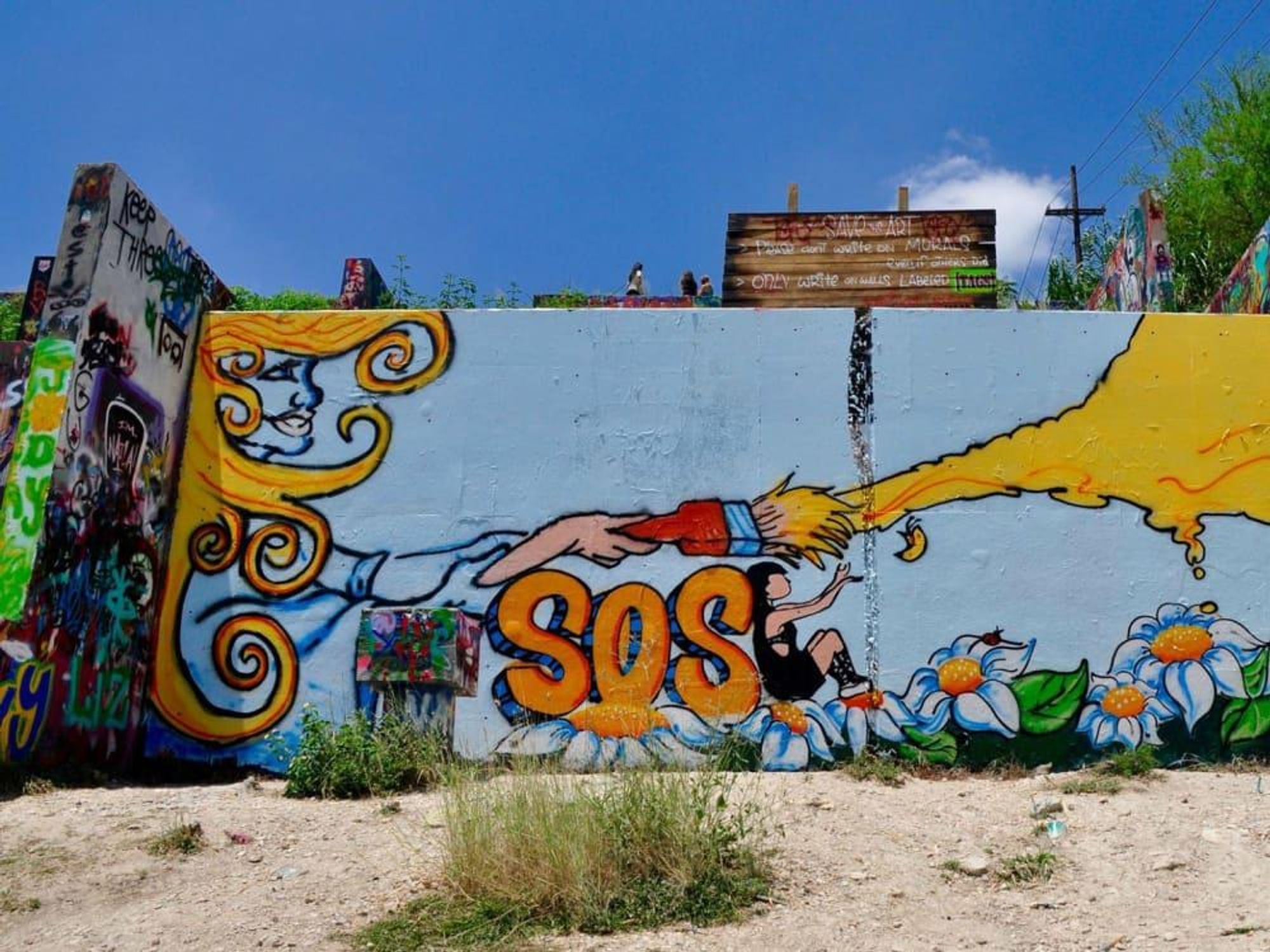 SOS mural Castle Hill Austin