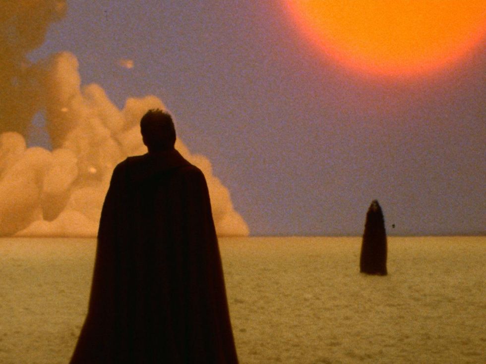 still from Drafthouse Films The Visitor with John Huston