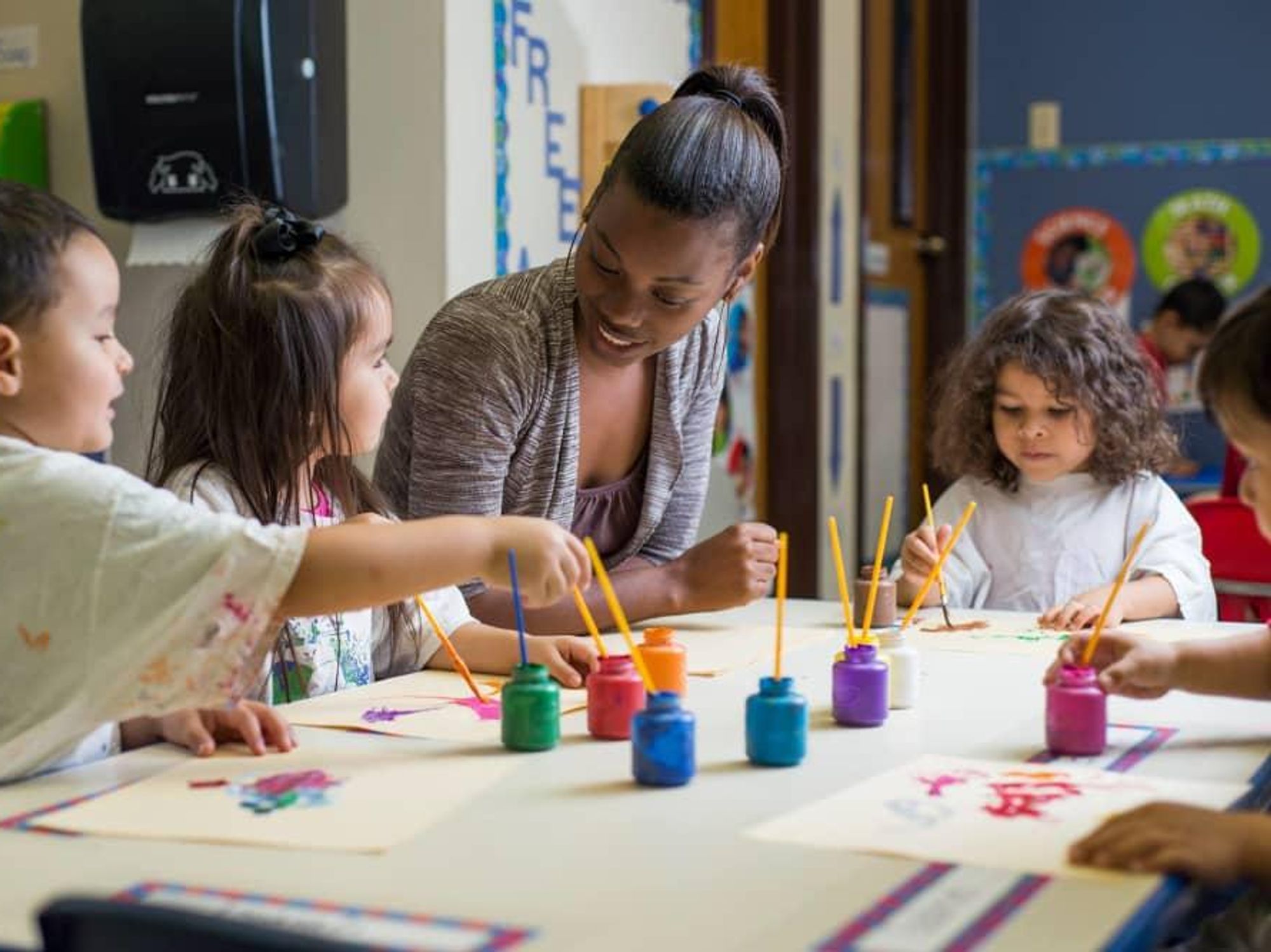 Teacher with young students