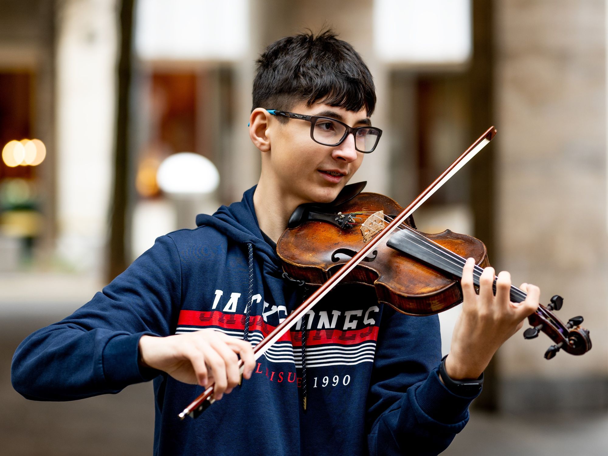 Teen playing violin