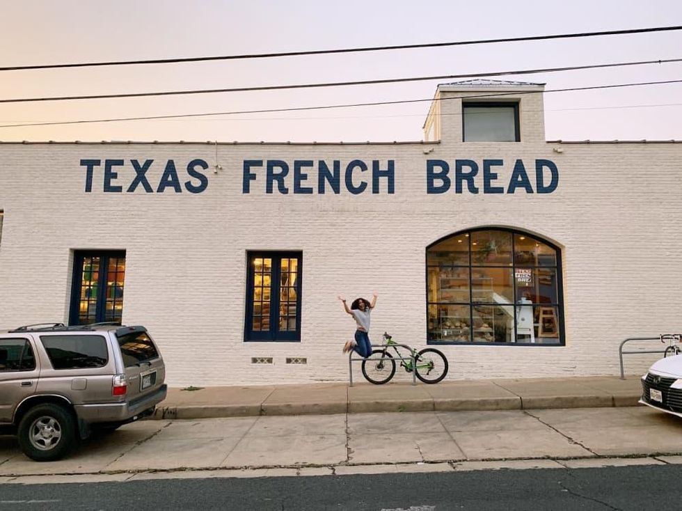 Texas French Bread exterior person jumping