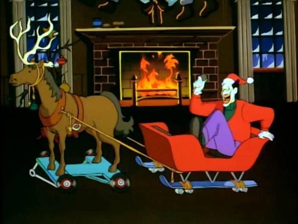 The Joker from Batman: The Animated Series in a sleigh with reindeer