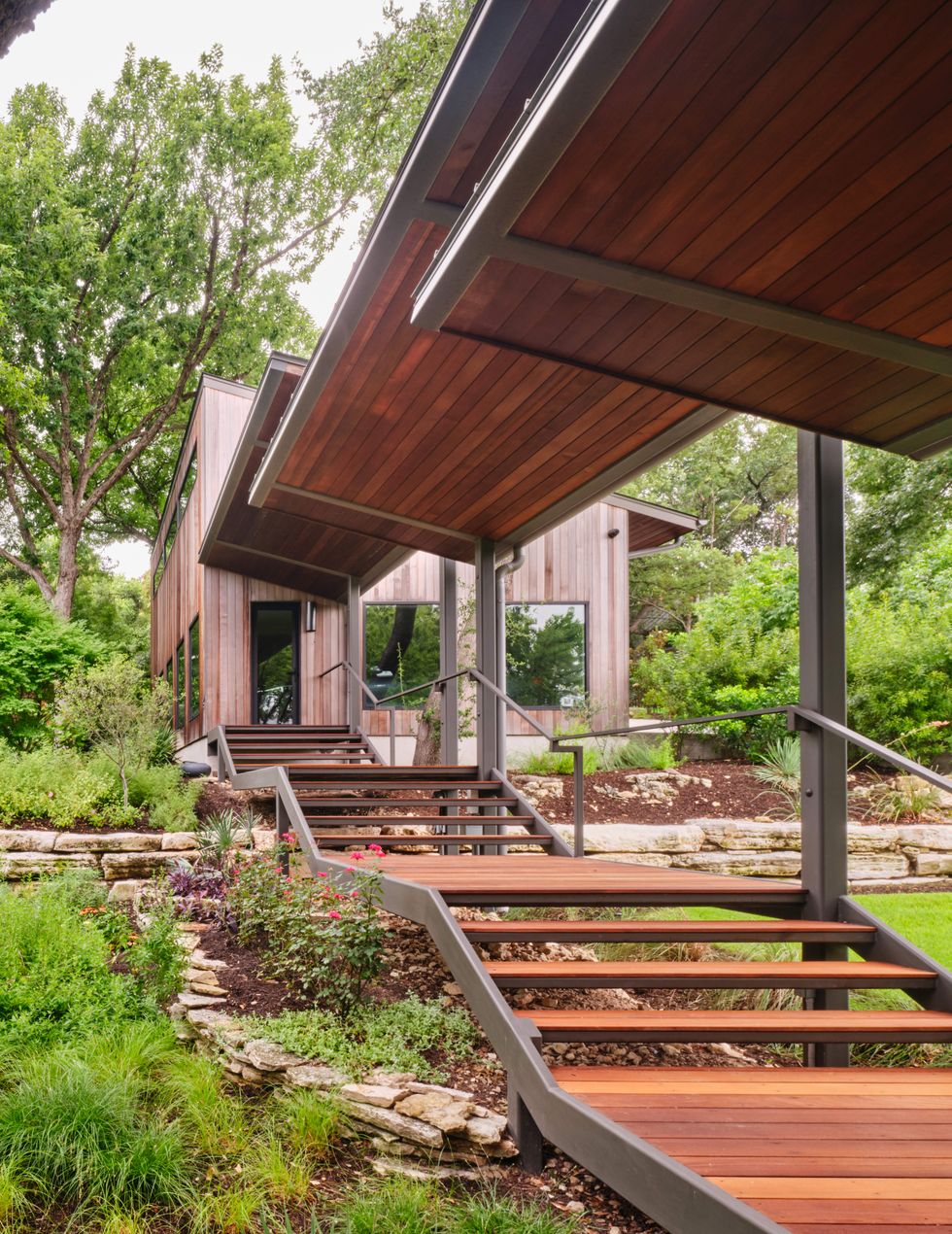 This home by Hogan Architects + Development features multiple buildings and walkways