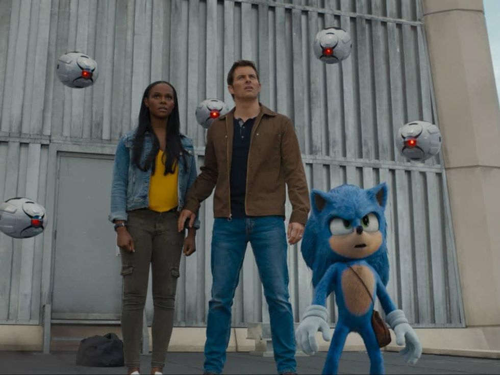 Tika Sumpter, James Marsden, and Sonic in Sonic the Hedgehog