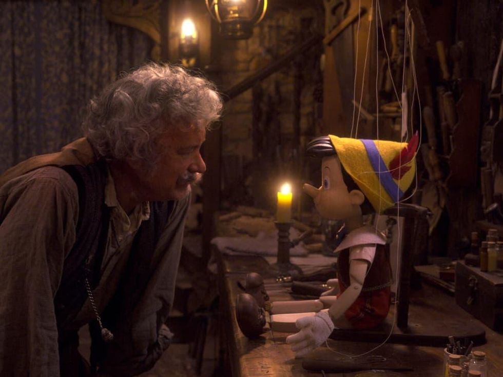 Tom Hanks and Pinocchio (Benjamin Evan Ainsworth) in Pinocchio