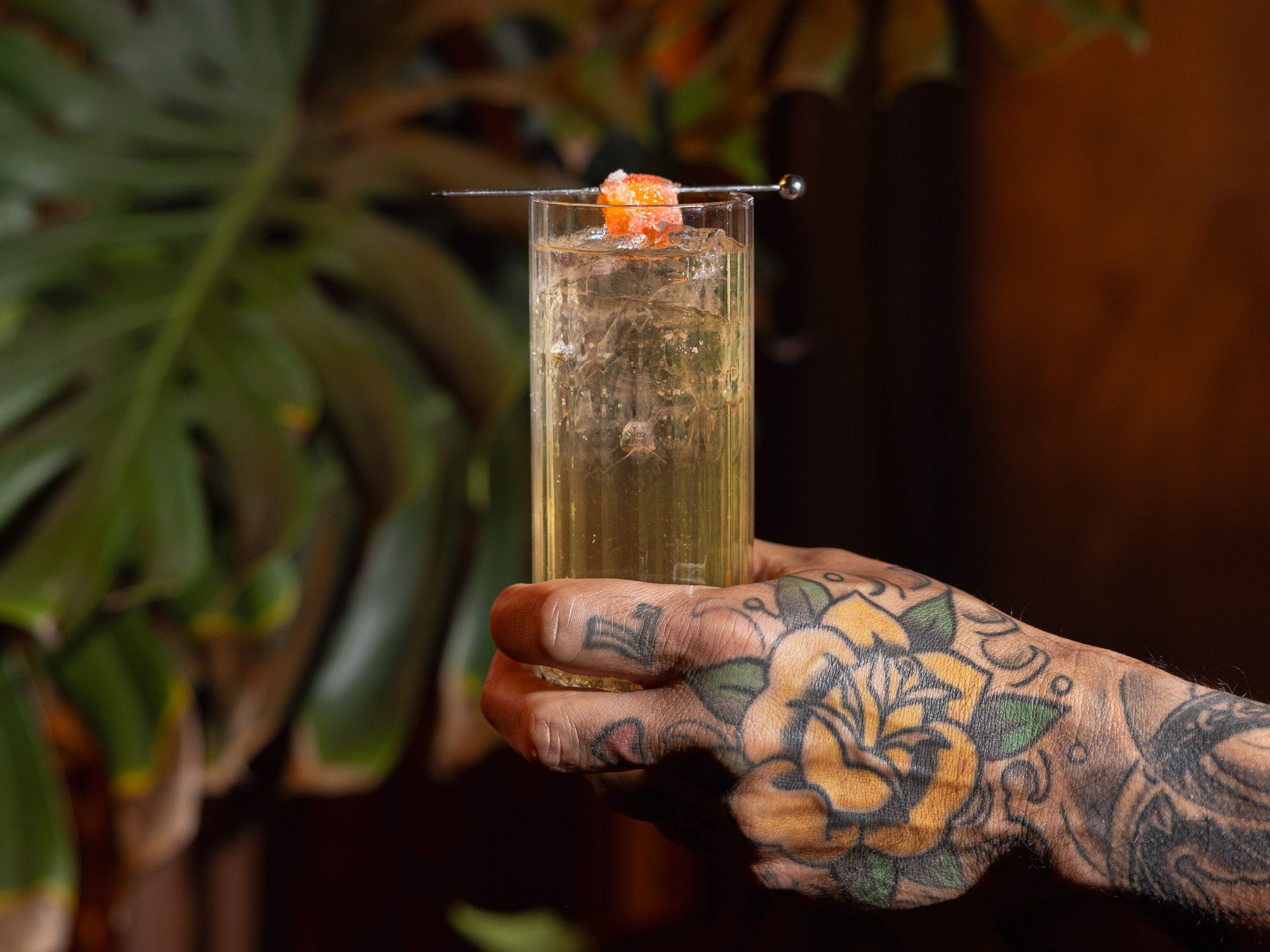 Trona hand holding cocktail