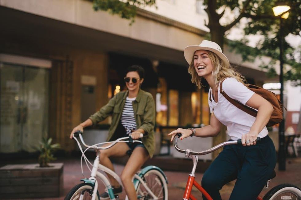 Two girls riding bikes