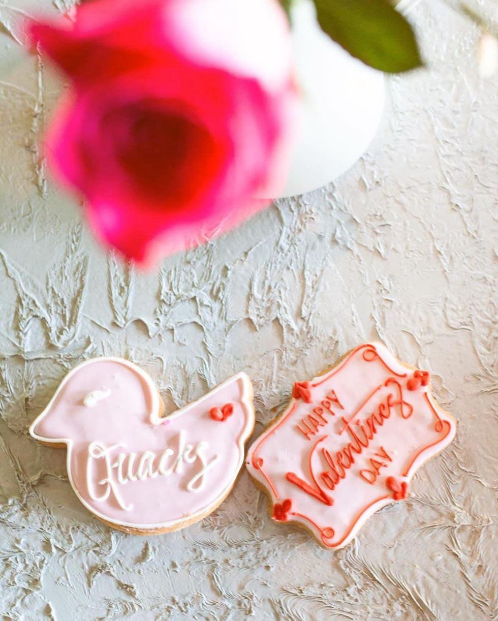 Two Valentine's Day cookies from Quack's bakery: a duck and a fancy shape.