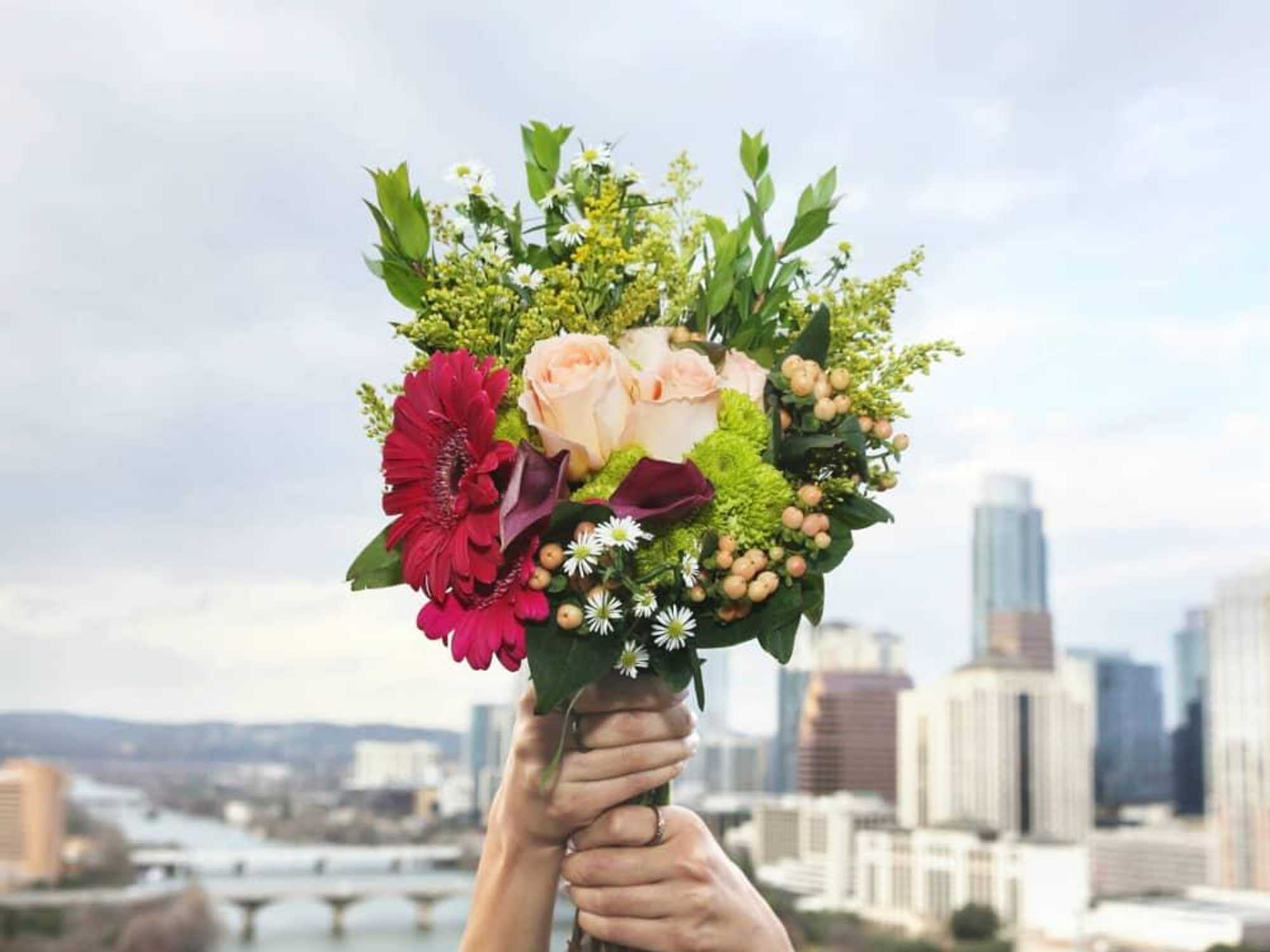 UrbanStems flower delivery service bouquet Austin skyline