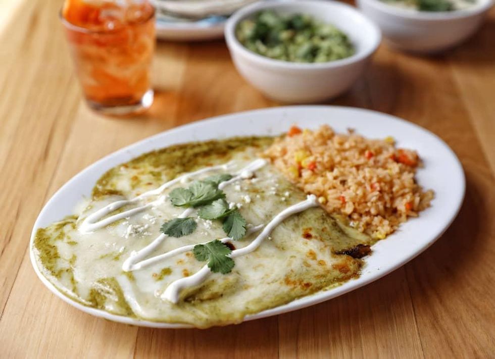 Vamanos' enchiladas come in beef, chicken, or cheese. CultureMap Austin
