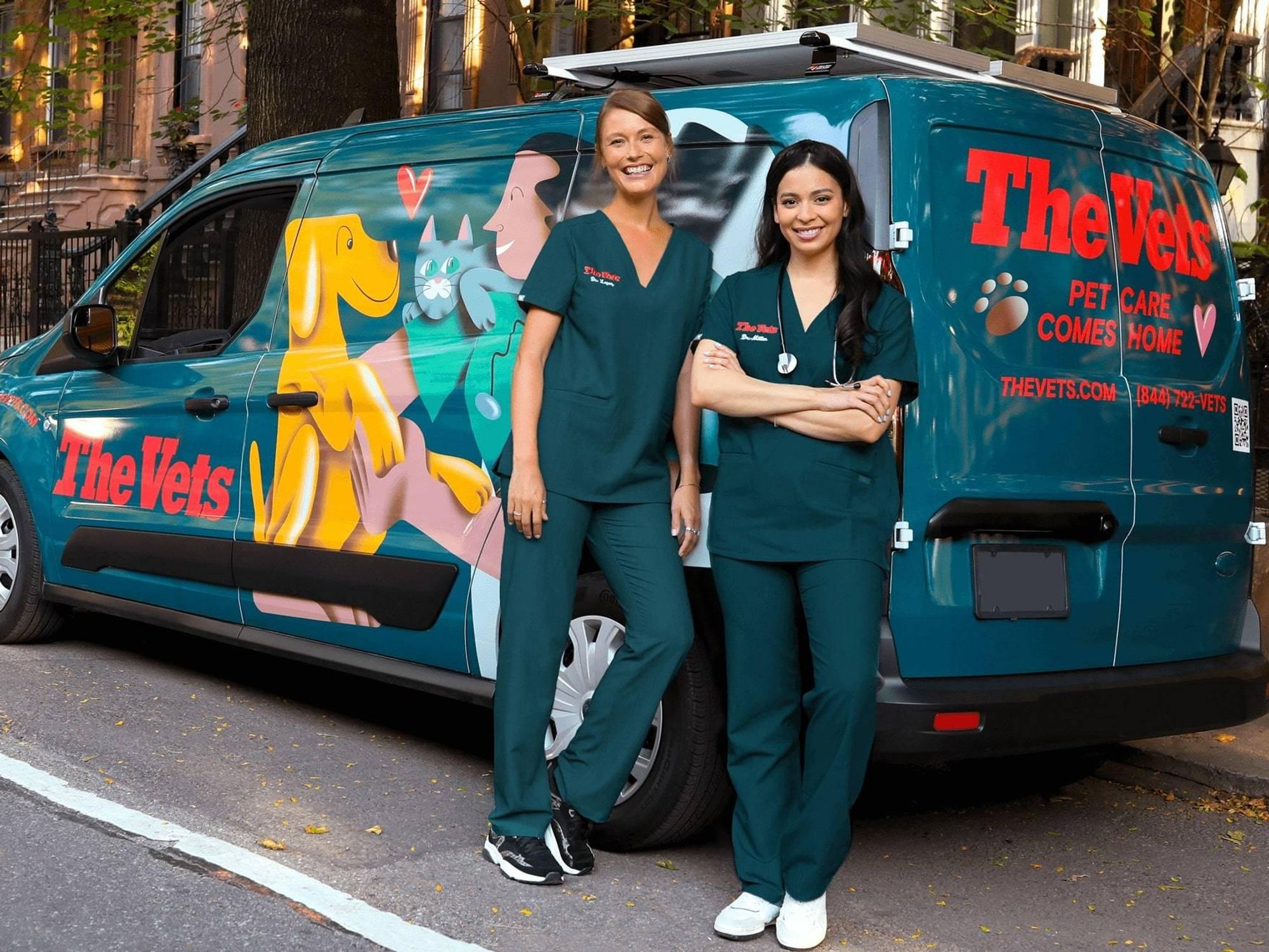 Vets outside of a The Vets van.