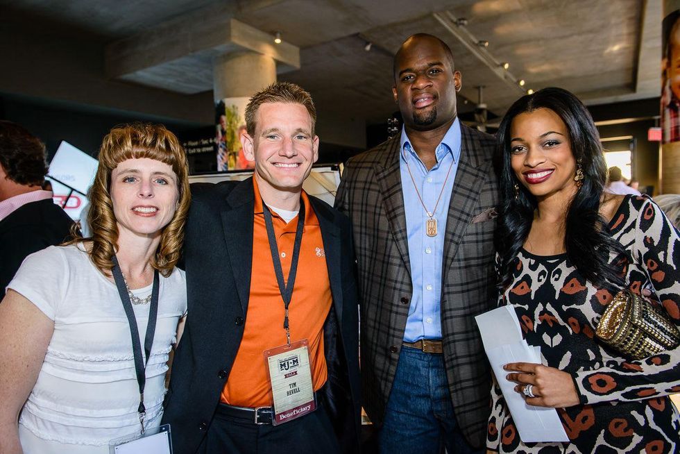 Vince Young and beneficiary at MJM benefit