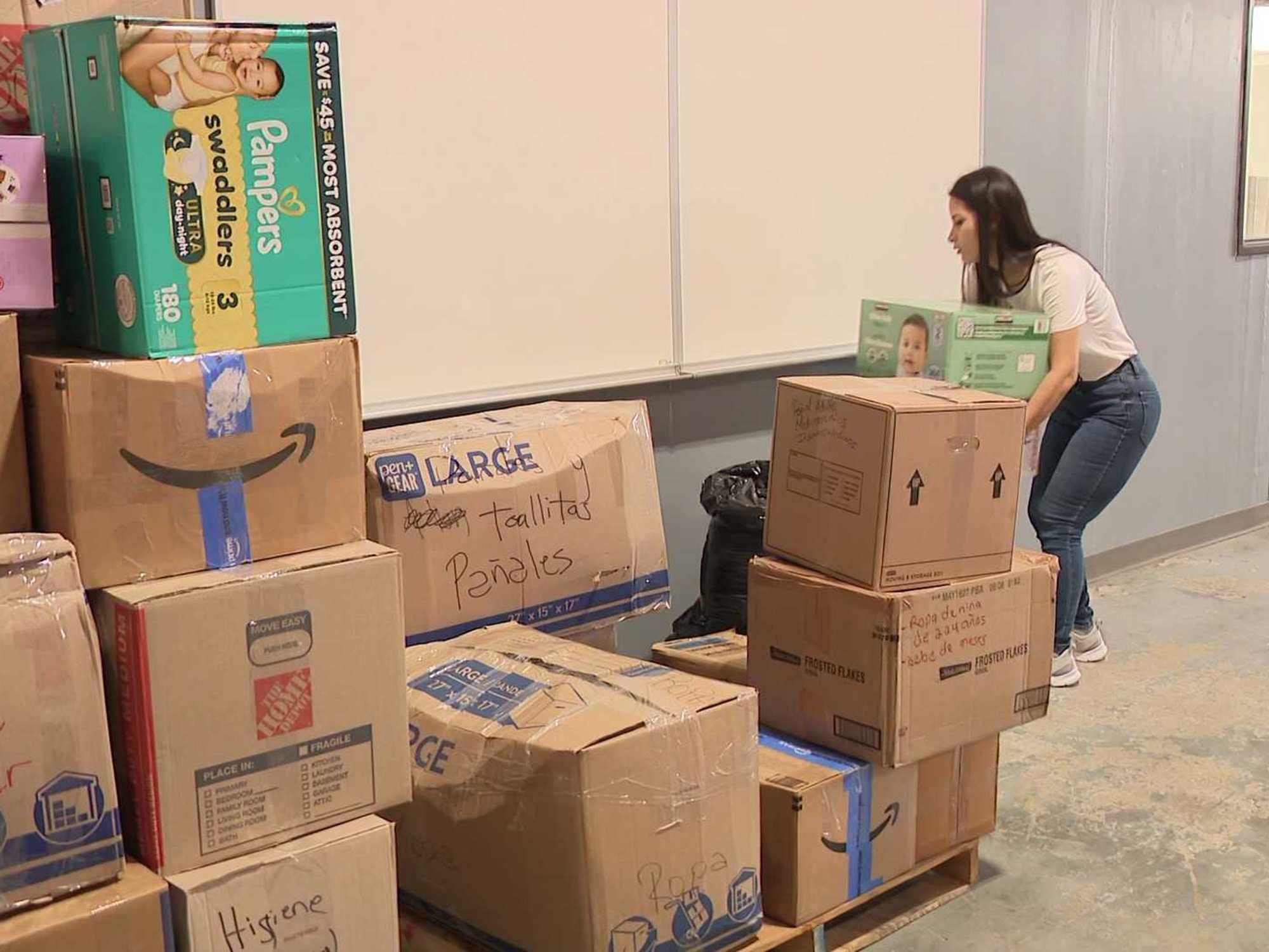 Volunteer sorting earthquake relief boxes