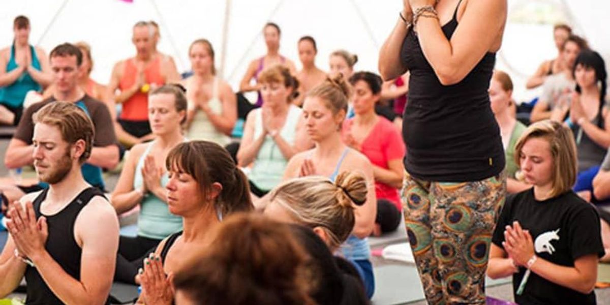 Spring athletes participate in yoga at Divine Yoga