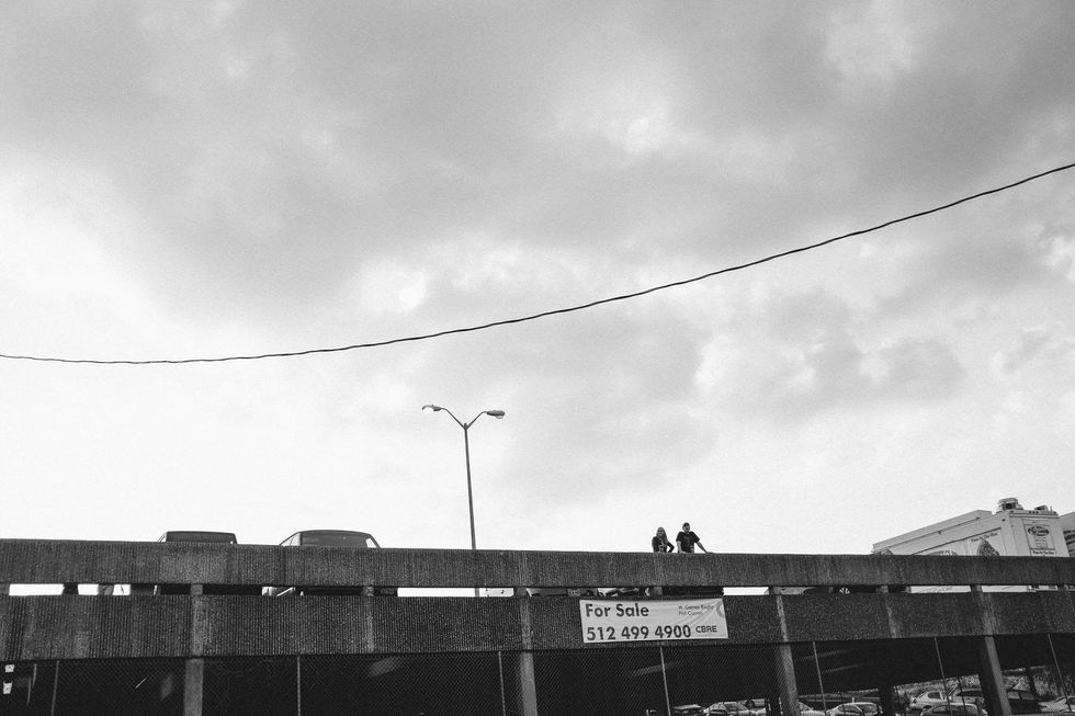 watching from across the street