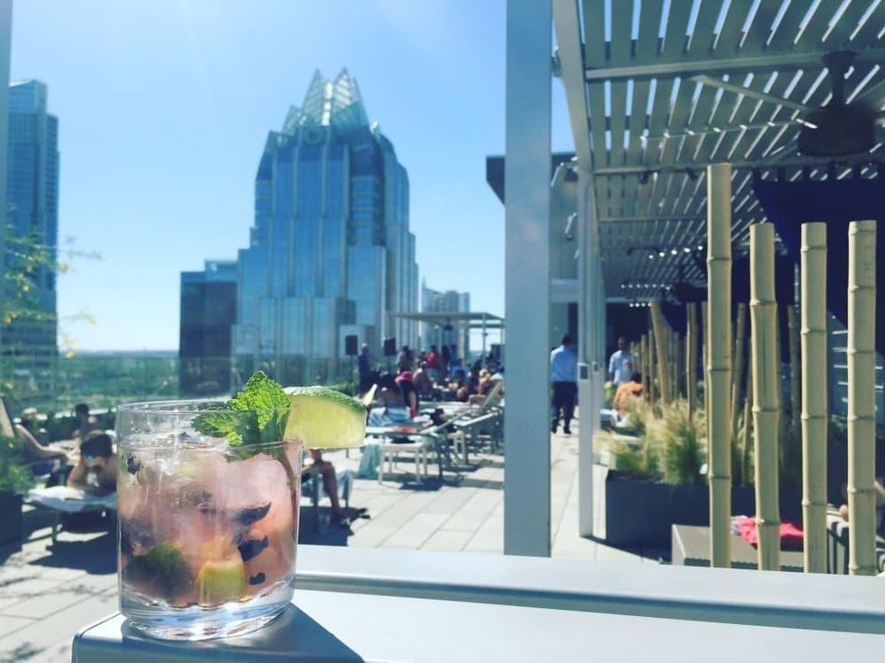 West Austin Downtown hotel rooftop pool patio view cocktail
