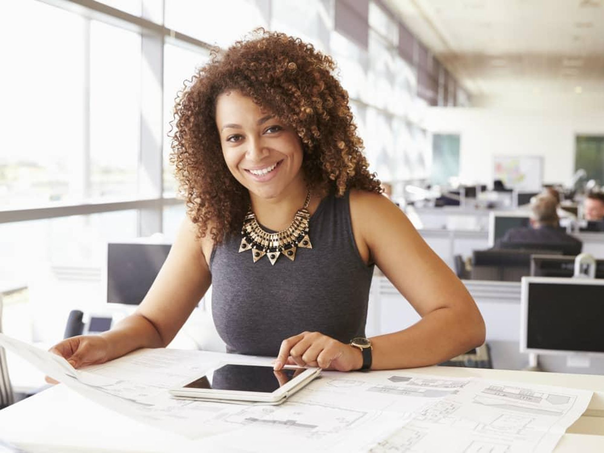 Woman at work with a tablet/computer