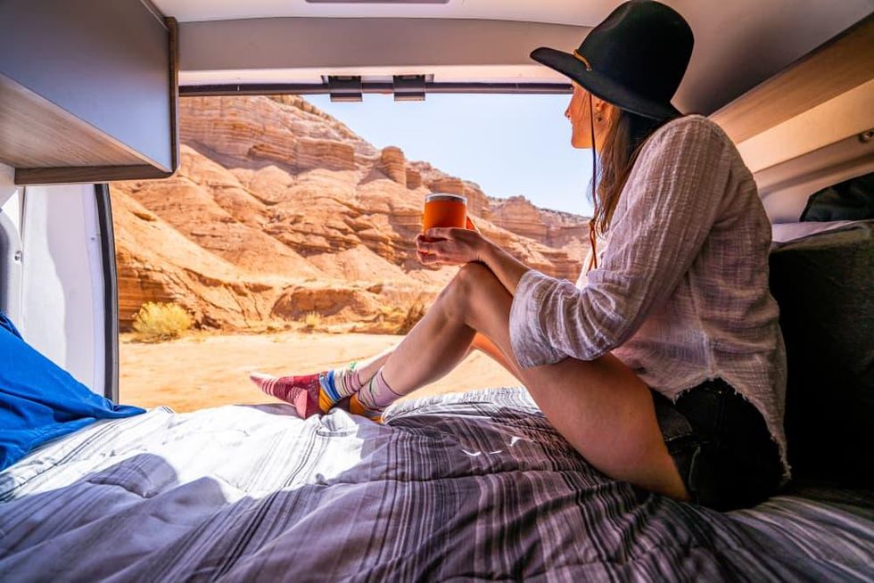 Woman looking out of RV