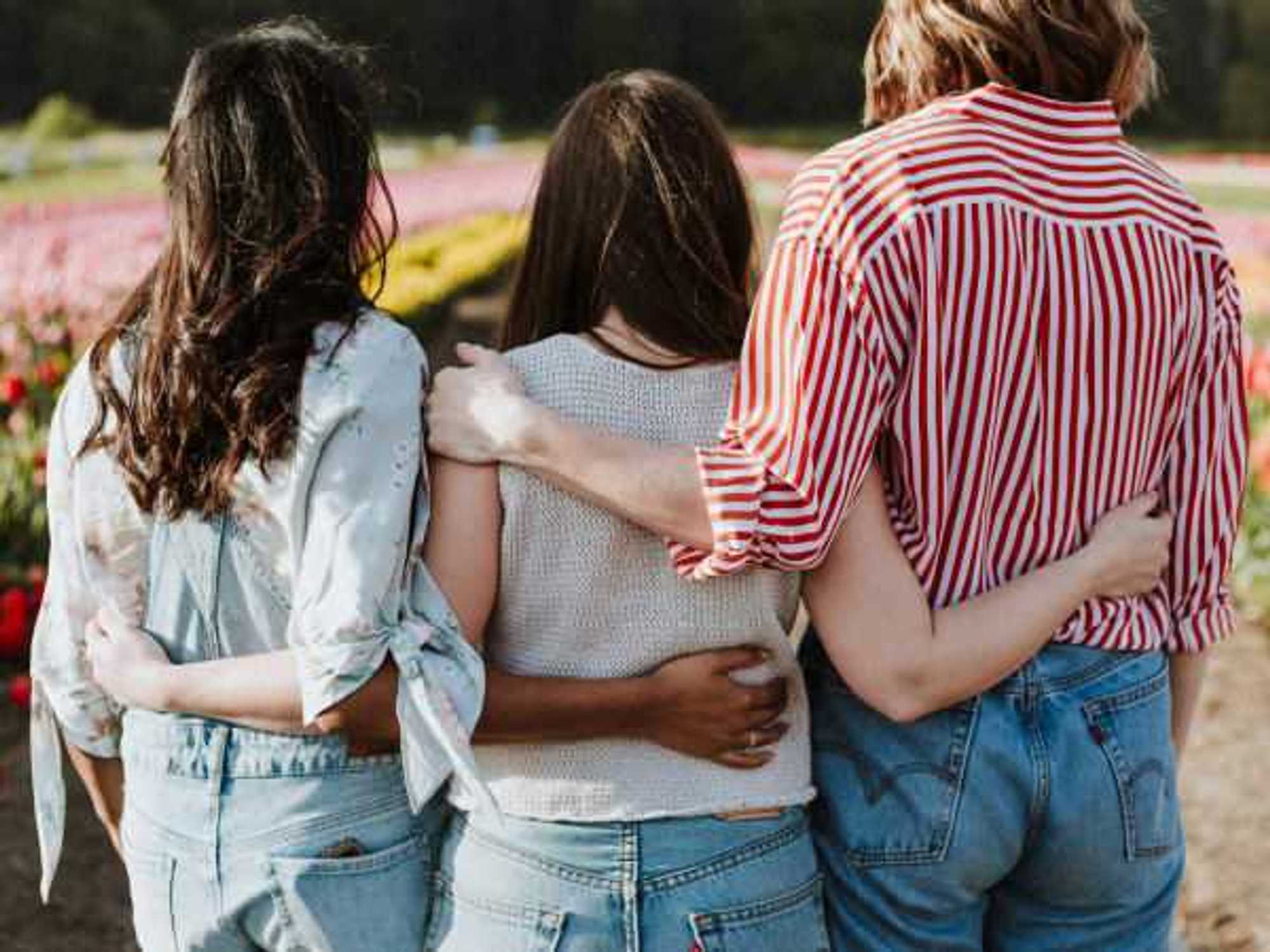 Women's equality, women hugging