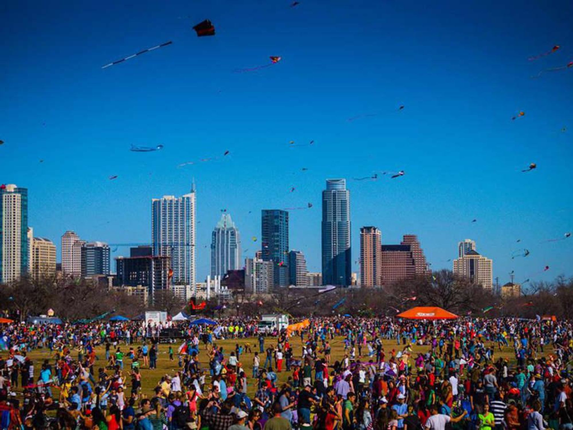 Zilker Kite Festival with downtown Austin in background